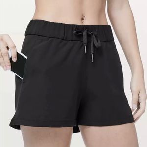 Lululemon 2.5” On The Fly Woven Black Drawstring Shorts Size 4